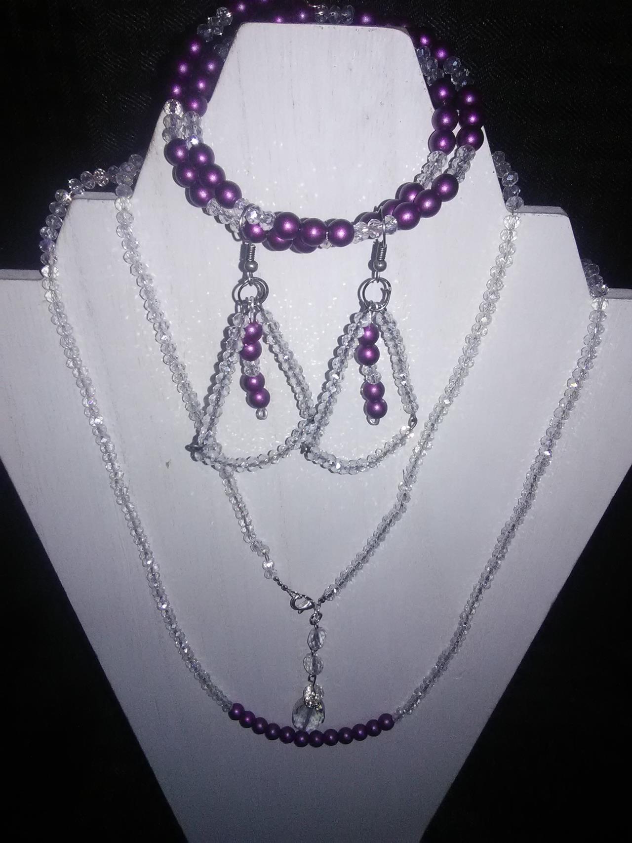 Purple and White colored glass crystal jewelry set.